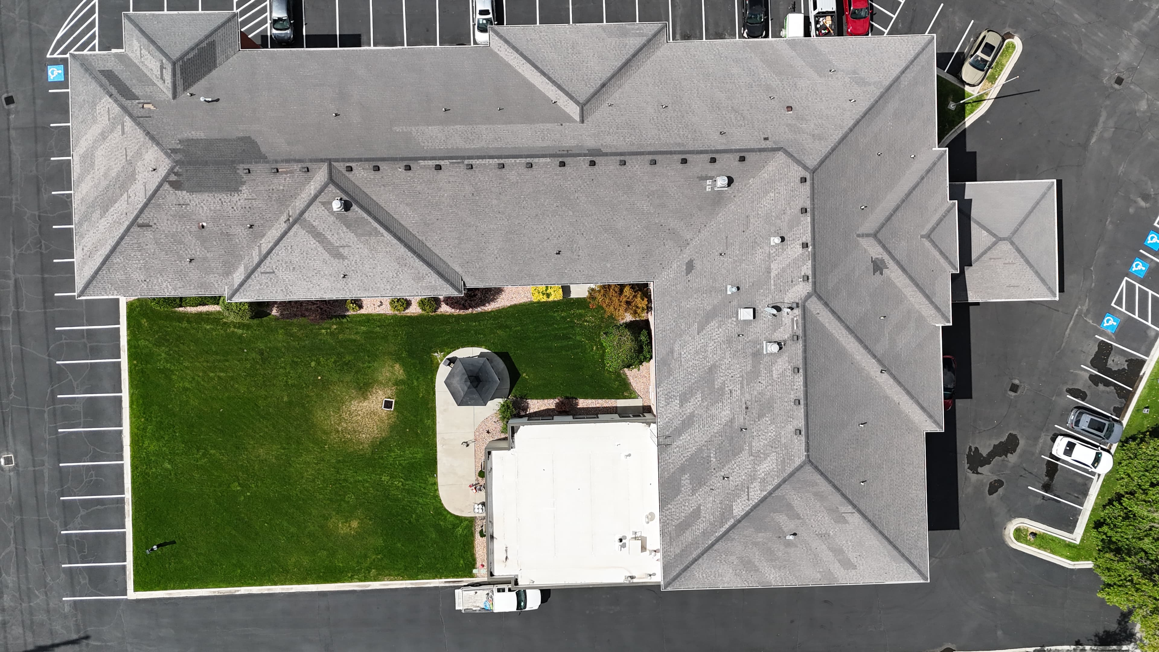 Completed roof repair with new flashing and shingles