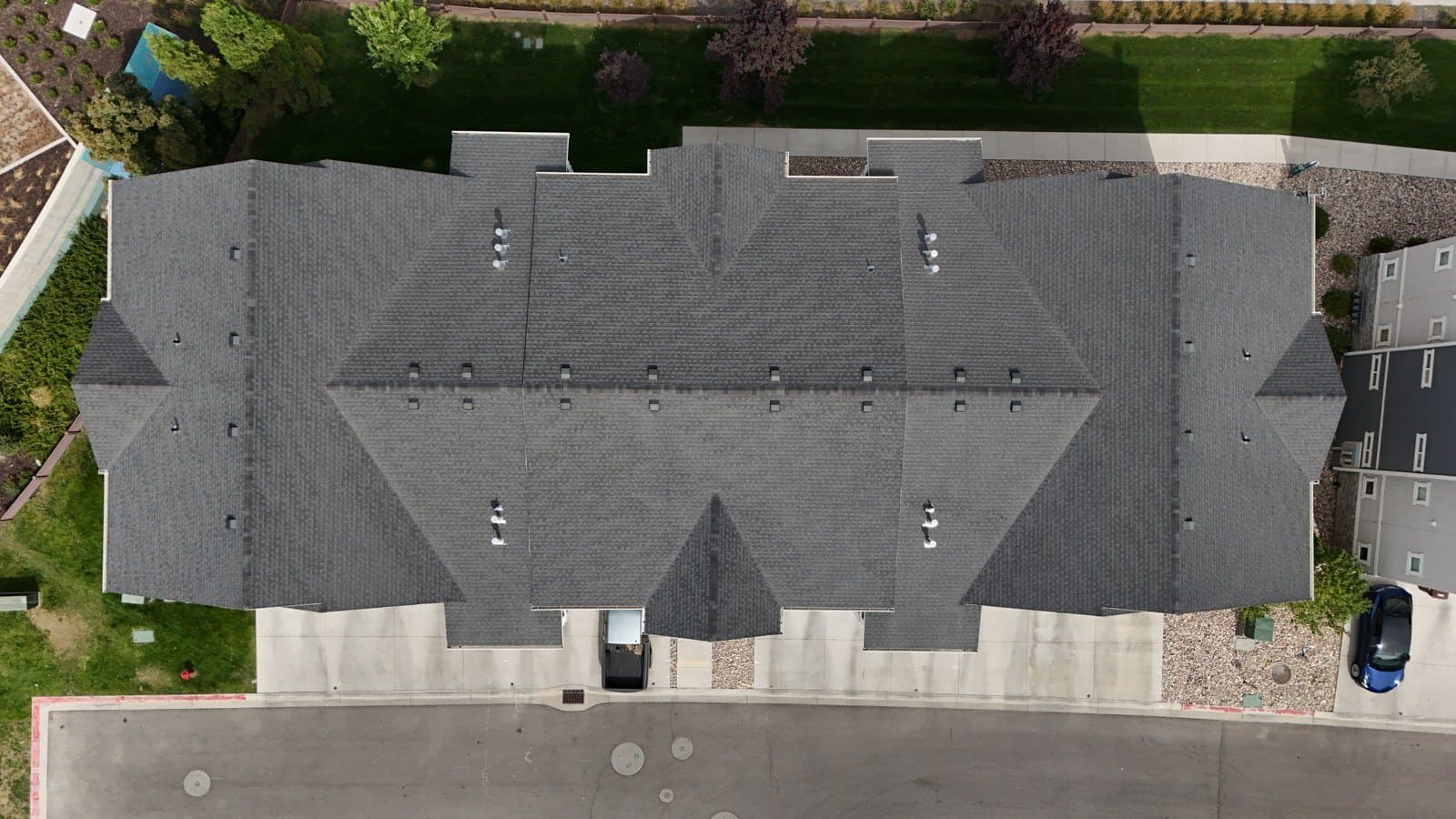 Overhead drone view of a Preserve at Waters Edge building before replacement, August 2025